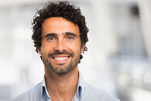 Patient in Toronto smiling with dental implants