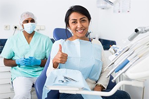 Patient in Toronto smiling with dental implants