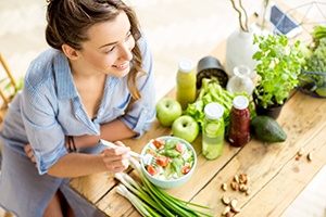 Patient in Toronto eating with dental implants